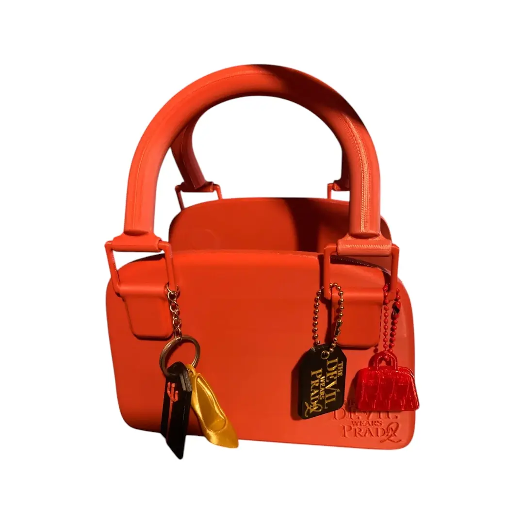 Palomera estreno de película El diablo viste a la moda 2 + llaveros